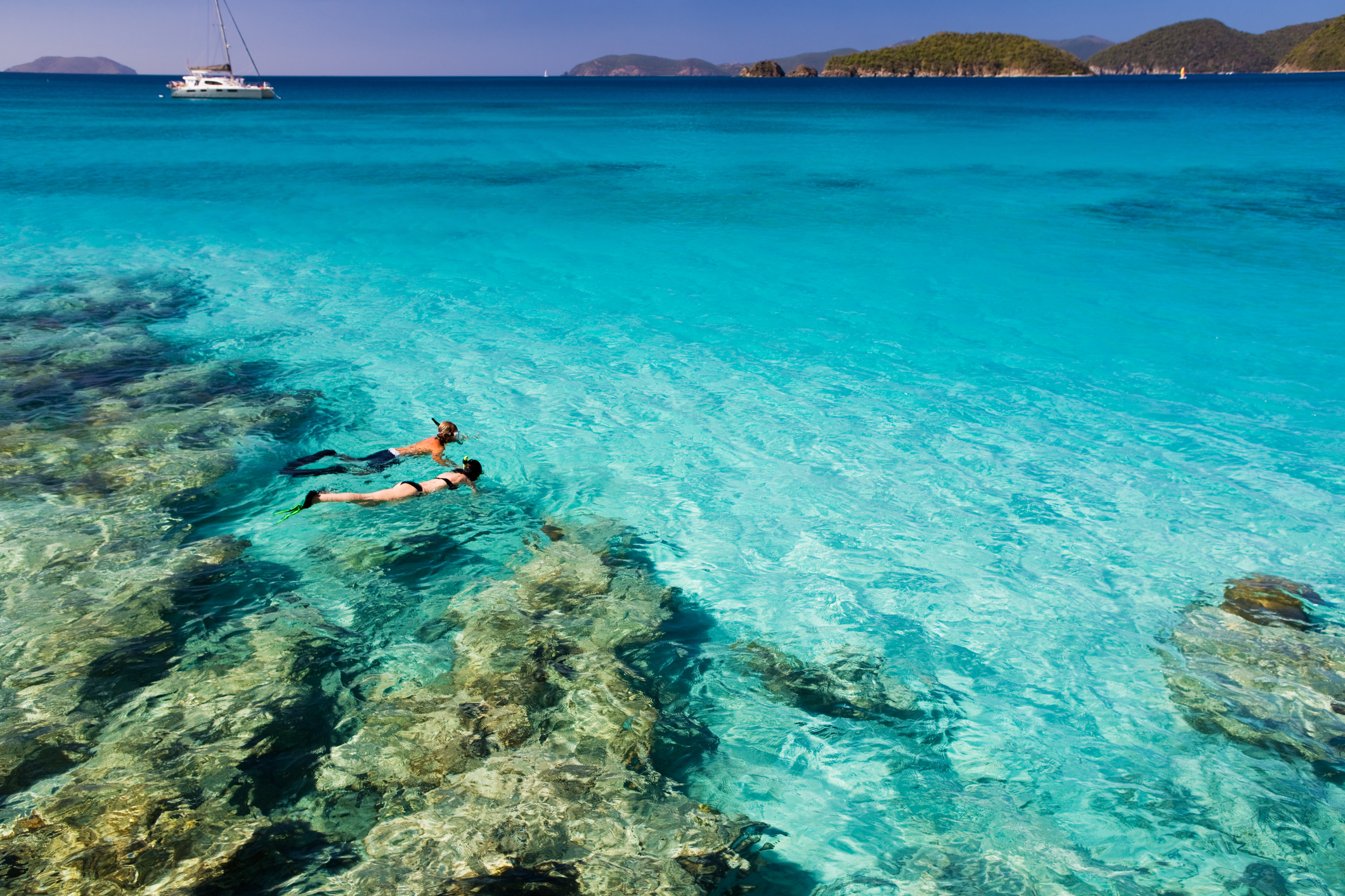 honeymoon couple snorkeling in the Caribbean waters