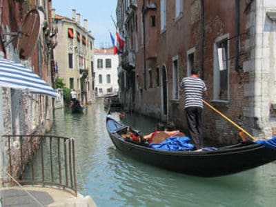2. Get paddled through the streets.