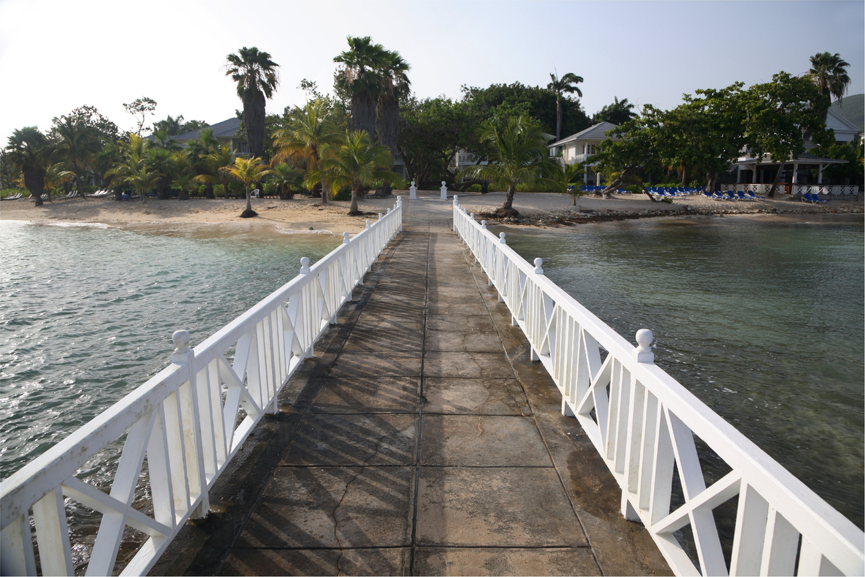 a walkway by a beach resort in Montego Bay