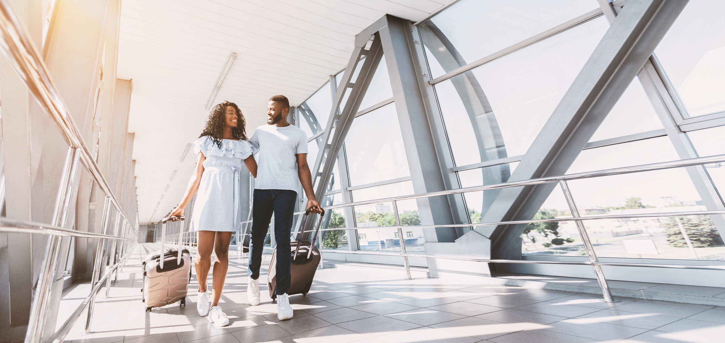 couple walking at the airport