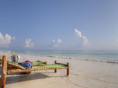 wooden sunlounger by the beach in Zanzibar