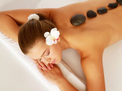 a woman getting a spa treatment at Mount Cinnamon Resort in Grenada