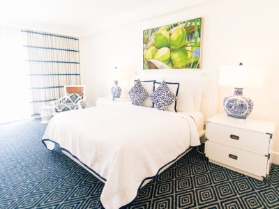 a king sized bed inside a suite in a Key West resort
