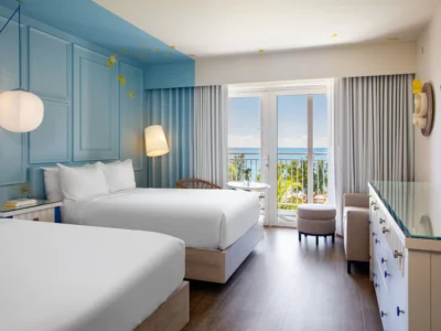 two beds inside a suite in Renaissance Wind Creek Curacao Resort