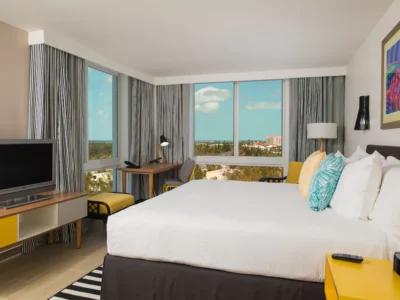 a king's sized bed inside Warwick Paradise Island
